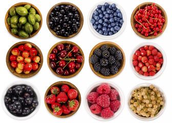 Wall Mural - Collage of different fruits and berries isolated on white. Strawberries, currants, blackberries; blueberries, gooseberry, cherries, raspberries. Collection of fruits and berries in a bowl. Top view.