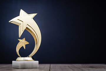 Wall Mural - elegant winners trophy with shooting stars