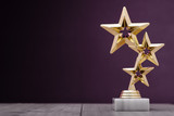 Fototapeta  - Gold winners award with three stars
