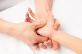 Fototapeta Las - massage hands at certain points, hands close-up