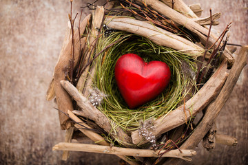 Easter heart decor on a wooden background. Pattern.