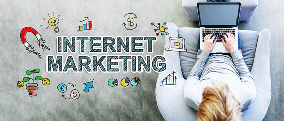 Sticker - Internet Marketing text with man using a laptop