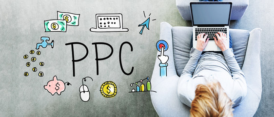 Wall Mural - ppc text with man using a laptop