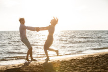 happiness and romantic Scene of love couples partners on the Beach