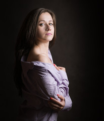 Wall Mural - Portrait of beautiful sensual woman with blue eyes. Studio shot.