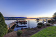 © Iriana Shiyan - Private dock with jet ski lifts and covered boat lift, Lake Washington.