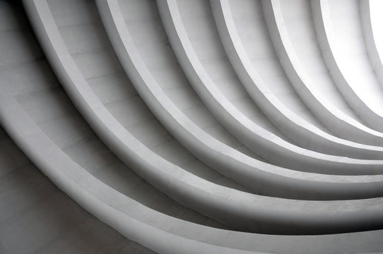 architectural background. modern white concrete arched composition in perspective. semicircular shap
