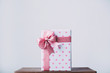 Beautiful gift box with a pink bow.