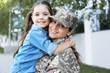 © Africa Studio - Mother in army uniform and daughter in the street