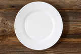 Fototapeta  - Empty Plate On The Wooden Table ./Empty Plate On The Wooden Table 