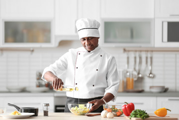 Sticker - Mature Indian chef cooking in kitchen