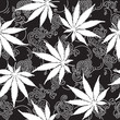 Cannabis or Marijuana seamless pattern.
Hand drawn vector pattern with Cannabis leaves and clouds of smoke.