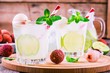 Cold fresh lemonade with lychee, lime and mint in glass