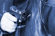 © milankubicka - man with hand gun pistol rubber attack violence