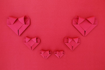 Poster - six folding red paper hearts on red for valentine pattern and ba