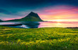 Colorful summer sunset with Kirkjufell mountain.