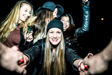 Four girls making party outdoor in the night