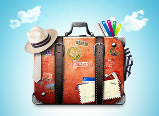 Wall Mural - retro suitcase of a traveler with travel stickers