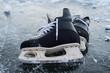 hockey scates on ice pond riwer