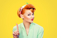 Woman Gesturing A No Sign. Serious Pinup Retro Style Girl Raising Finger Up Saying Oh No