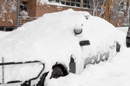 Police car buried in the snow Stock Photo | Adobe Stock