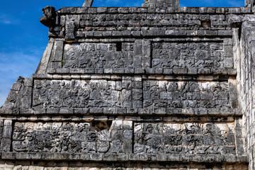 Poster - Ancient Mayan carving on the facade of the Osario pyramid in the Chichen Itza archaeological area in Yucatan, Mexico.