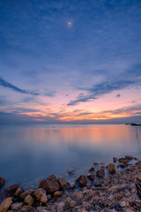 Wall Mural - Beautiful coast sea with the moon at twilight