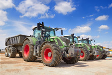 Agricultural Machinery. Tractor, Standing In A Row