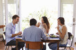 © Monkey Business - Group Of Friends Enjoying Dinner Party At Home Together