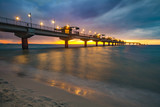 Fototapeta  - pier overlooking the sea after sunset