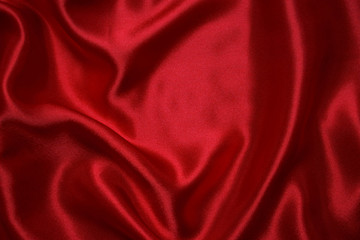 Wall Mural - Red cloth waves background texture.