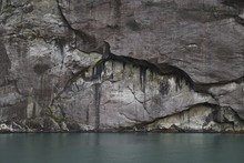 Sheer Rocks Faces Along The Norwegian Fjords