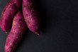 Pink potatoes on slate