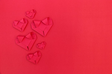 Poster - six folding red paper hearts on red for valentine pattern and ba
