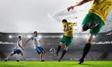 Fototapeta Sport - Hot moments of soccer match . Mixed media