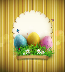 Vector vintage background with easter eggs, green grass and a ro