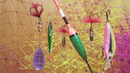 float and baits on a fishing net background