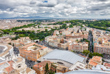 Fototapeta Miasto - Cloudy view of Vatican and Rome from the top of the dome of St Peter's Basilica, Lazio region, Italy.