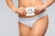 © puhhha - Women Health. Beautiful Female Body In Panties With Smiley Card