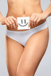 © puhhha - Women Health. Beautiful Female Body In Panties With Smiley Card