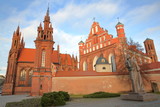 Fototapeta Miasto - VILNIUS, LITHUANIA: St Anne's Church and Bernardine Church with Adam Mickiewicz statue on the right hand side