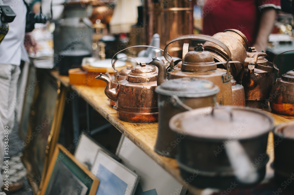 antique pans and pots at the street market in sweden - obrazy, fototapety, plakaty 