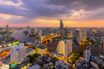 Wall Mural - Aerial view of Bangkok modern office buildings, condominium, living place in Bangkok city downtown with sunset scenery, Bangkok is the most populated city in Southeast Asia.Bangkok , Thailand