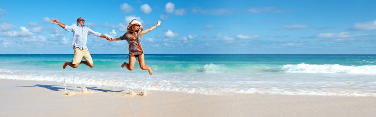 Couple running on the beach