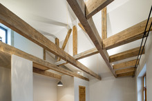 Wooden Interior Design. Wooden Beams And Floor To Ceiling As A D