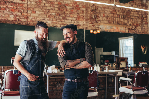 Fotografie, Obraz Hairdresser with a man standing at barbershop