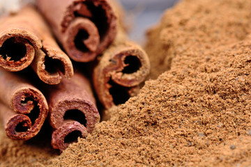 Canvas Print - Cinnamon sticks with powder