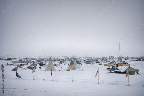 Fotografie, Obraz Cloudy, snowy day at Oceti Sakowin Camp, Cannon Ball, North Dakota, USA, January
