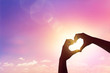 © ifriday - Close up love shape of hand at snow background.