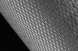 Leinwandbild Motiv mesh metal for filter in roll on a black background